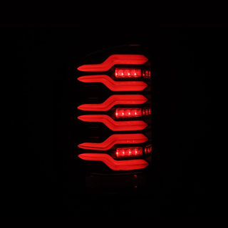 AlphaRex 14-18 GMC Sierra 1500/2500HD/3500HD LUXX-Series LED Tail Lights Alpha-Blk Actv Lgt Seq. Sig